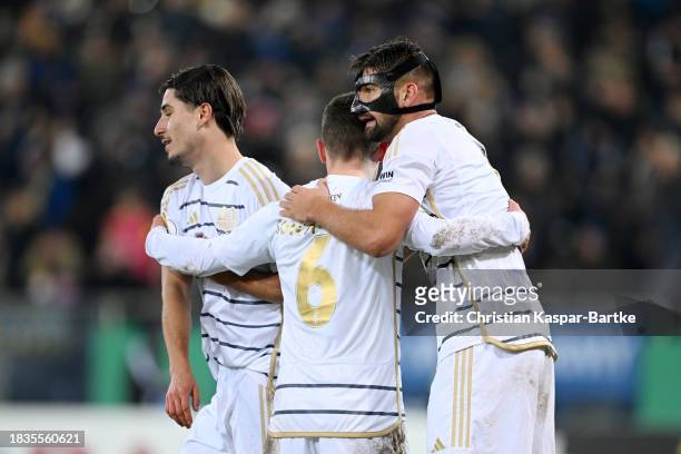 Kai Bruenker of 1. FC Saarbruecken celebrates with teammates after scoring his team's first goal during the DFB cup round of 16 match between 1. FC...