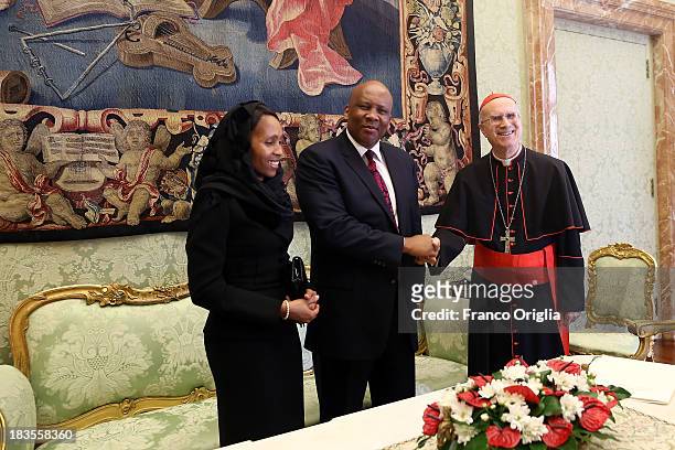 Vatican secretary of state cardinal Tarcisio Bertone receives the King of Lesotho Letsie III and the Queen Masenate Mohato Seeiso after an audiuence...