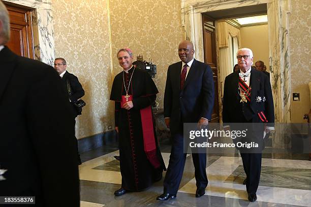 King of Lesotho Letsie III , flanked by Prefect of the Pontifical House and former personal secretary of Pope Benedict XVI Georg Ganswein arrives at...