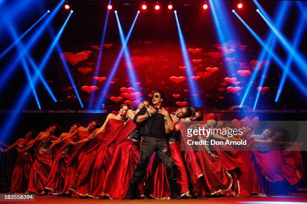 Bollywood actor Shahrukh Khan performs live on stage at Allphones Arena on October 7, 2013 in Sydney, Australia. This performance of 'Temptation...