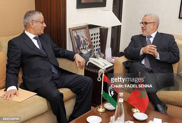Libyan Prime Minister Ali Zeidan meets with Moroccan Prime Minister Abdelilah Benkirane on October 7, 2013 in Rabat during the former's three day...