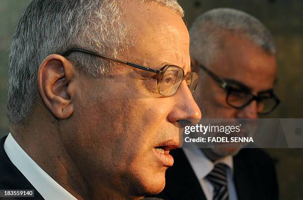 Libyan Prime Minister Ali Zeidan speaks during a joint press conference with his Moroccan counterpart Abdelilah Benkirane in Rabat on October 7, 2013...