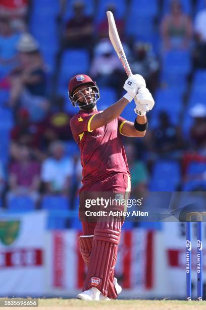 Shai Hope of West Indies hits a boundary during the 2nd CG United One Day International match between West Indies and England at Sir Vivian Richards...