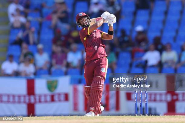 Shai Hope of West Indies hits a boundary during the 2nd CG United One Day International match between West Indies and England at Sir Vivian Richards...