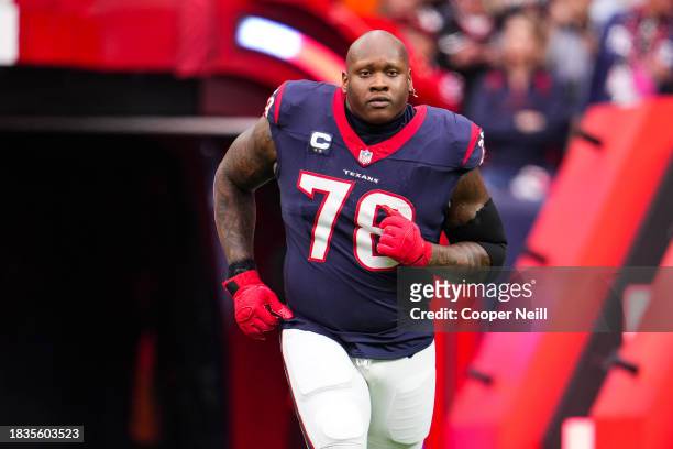 Laremy Tunsil of the Houston Texans runs out of the tunnel prior to an NFL football game against the Denver Broncos at NRG Stadium on December 3,...