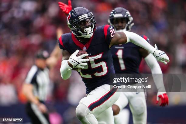 Desmond King II of the Houston Texans celebrates runs the ball during an NFL football game against the Denver Broncos at NRG Stadium on December 3,...