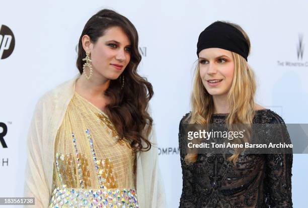 Tatiana Santo Domingo and Eugenia Niarchos attend the amfAR Cinema Against AIDS 2010 at the Hotel du Cap during the 63rd Annual Cannes Film Festival...