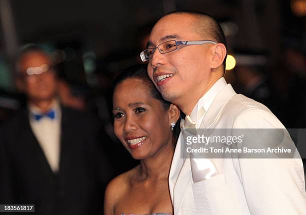 Wallapa Mongkolprasert and Apichatpong Weerasethakul attend the 'Uncle Boonmee Who Can Recall His Past Lives' Premiere at the Palais des Festivals...