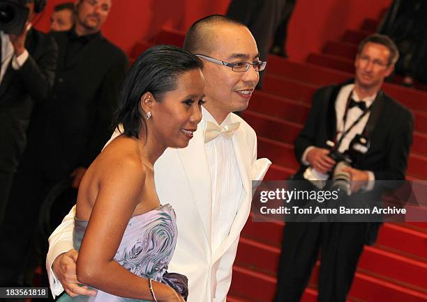 Wallapa Mongkolprasert and Apichatpong Weerasethakul attend the 'Uncle Boonmee Who Can Recall His Past Lives' Premiere at the Palais des Festivals...