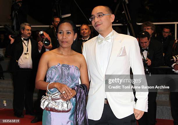 Wallapa Mongkolprasert and Apichatpong Weerasethakul attend the 'Uncle Boonmee Who Can Recall His Past Lives' Premiere at the Palais des Festivals...