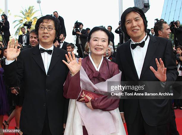 Jun-dong Lee, Jeong-hee Yoon and Chang-Dong Lee attend the Palme d'Or Closing Ceremony held at the Palais des Festivals during the 63rd Annual...