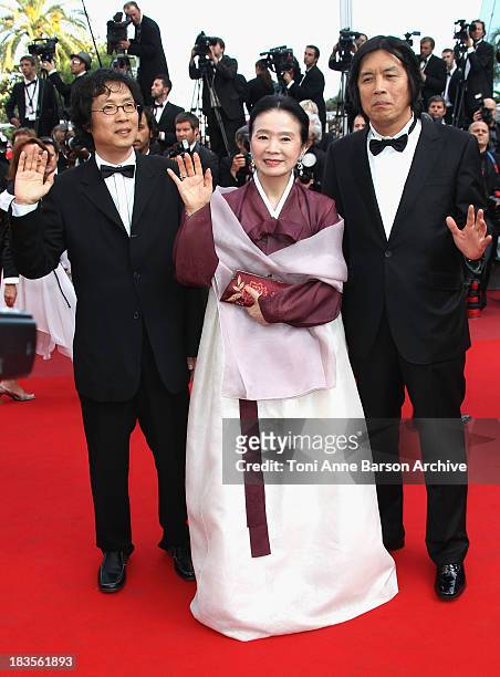 Jun-dong Lee, Jeong-hee Yoon and Chang-Dong Lee attend the Palme d'Or Closing Ceremony held at the Palais des Festivals during the 63rd Annual...