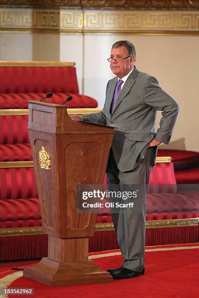 Sports commentator Clive Tyldesley addresses an audience in the Ballroom of Buckingham Palace at an event to honour The FA's 150 Grassroots Heroes on...