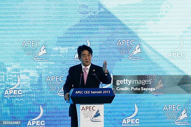 Japanese Prime Minister Shinzo Abe delivers his keynote addres during APEC CEO Summit on October 7, 2013 in Nusa Dua, Indonesia. US President Barack...