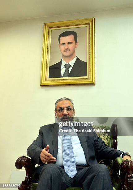 Syrian Information Minister Omran al-Zoubi speaks during the Asahi Shimbun interview on October 5, 2013 in Damascus, Syria. The minister insisted...