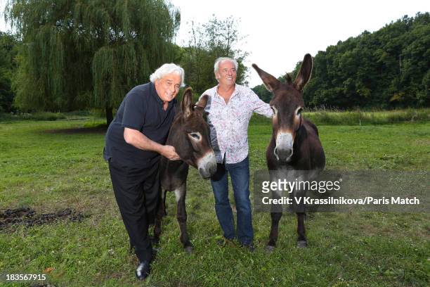 Singer Maxime Le Forestier and friend actor Jacques Weber are photographed at his home for Paris Match on August 29, 2013 in Vendome, France.