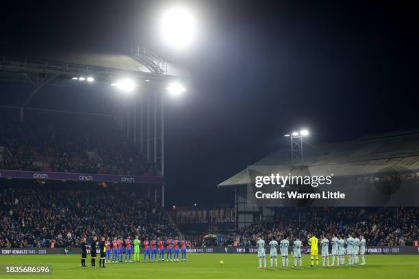 The players, match officials and fans observe a minutes applause following the recent passing of former England footballer and manager, Terry...