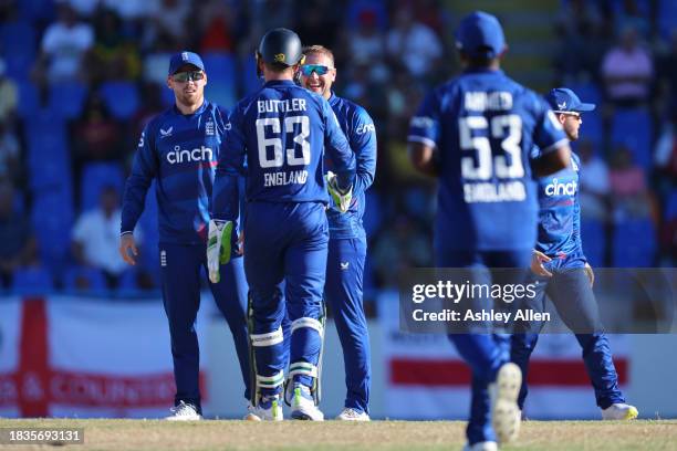 Liam Livingstone of England celebrates getting another wicket to his name during the 2nd CG United One Day International match between West Indies...