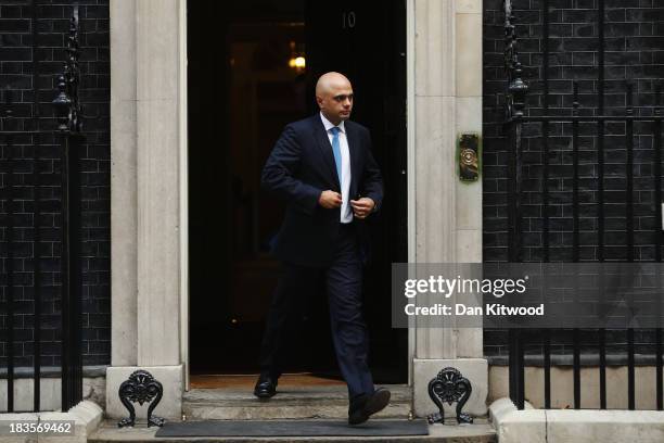 Former Treasury Minister Sajid Javid leaves 10 Downing Street on October 7, 2013 in London, England. British Prime Minister David Cameron announced a...