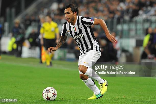 Carlos Tevez of Juventus in action during UEFA Champions League Group B match between Juventus and Galatasaray AS at Juventus Arena on October 2,...