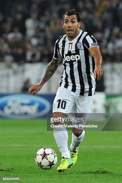 Carlos Tevez of Juventus in action during UEFA Champions League Group B match between Juventus and Galatasaray AS at Juventus Arena on October 2,...