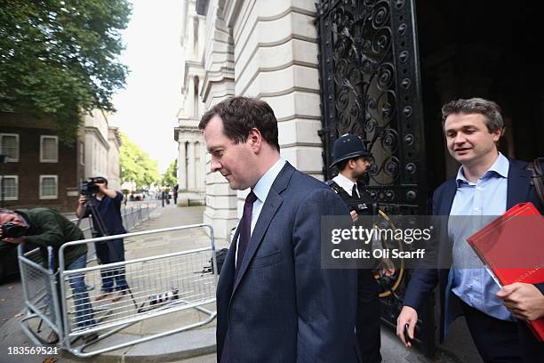 George Osborne , the Chancellor of the Exchequer, arrives at Number 10 Downing Street on October 7, 2013 in London, England. British Prime Minister...