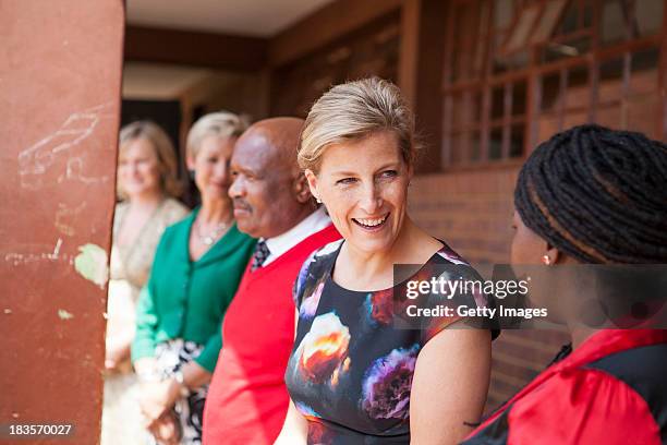 Sophie Countess of Wessex watches students perform at the Jabulile School on October 7, 2013 in Orange Farm, South Africa. The Earl and Countess of...