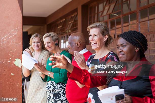 Sophie Countess of Wessex watches students perform at the Jabulile School on October 7, 2013 in Orange Farm, South Africa. The Earl and Countess of...