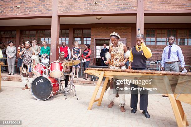 Students from Jabulile School perform for Sophie, Countess of Wessex on October 7, 2013 in Orange Farm, South Africa. The Earl and Countess of Wessex...