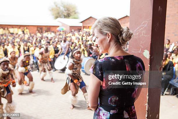 Sophie Countess of Wessex watches students perform at the Jabulile School on October 7, 2013 in Orange Farm, South Africa. The Earl and Countess of...