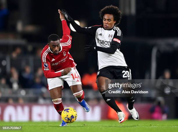 Callum Hudson-Odoi of Nottingham Forest battles for possession with Willian of Fulham during the Premier League match between Fulham FC and...