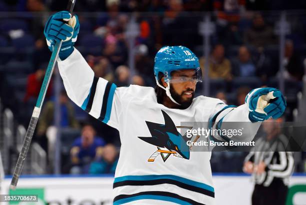 Anthony Duclair of the San Jose Sharks celebrates an overtime win against the New York Islanders at UBS Arena on December 05, 2023 in Elmont, New...