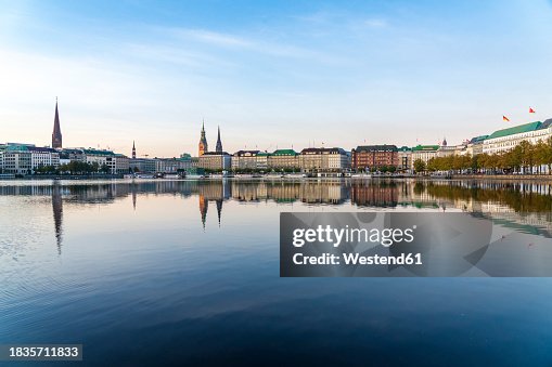 Reflection of buildings at Binnenalster lake, Hamburg, Germany Reflection of buildings at Binnenalster lake, Hamburg, Germany