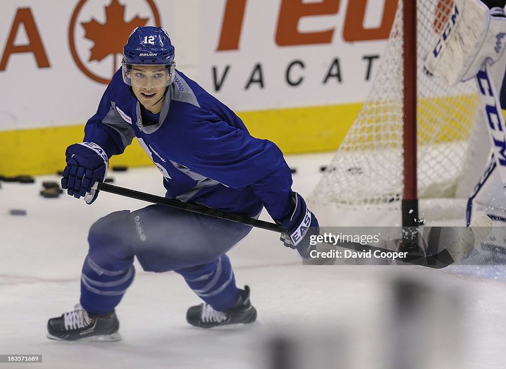 Toronto Maple Leafs left wing Mason Raymond (12) works out at practice at the