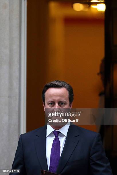 British Prime Minister David Cameron leaves Number 10 Downing Street on October 7, 2013 in London, England. British Prime Minister David Cameron...