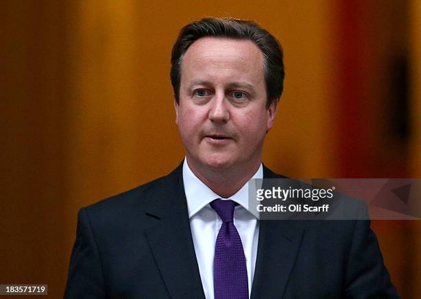 British Prime Minister David Cameron leaves Number 10 Downing Street on October 7, 2013 in London, England. British Prime Minister David Cameron...