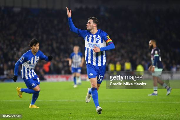 Pascal Gross of Brighton & Hove Albion celebrates scoring his team's first goal during the Premier League match between Brighton & Hove Albion and...
