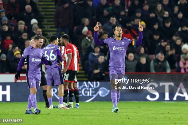 Virgil van Dijk of Liverpool celebrates scoring his team's first goal during the Premier League match between Sheffield United and Liverpool FC at...