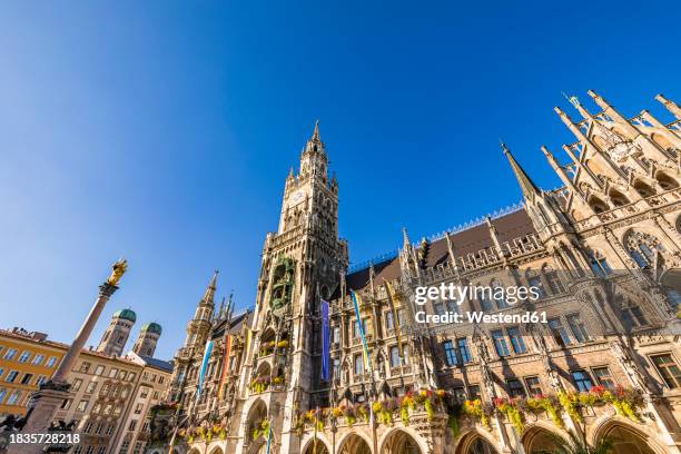 germany, bavaria, munich, new town hall on marienplatz - marienplatz stock-fotos und bilder