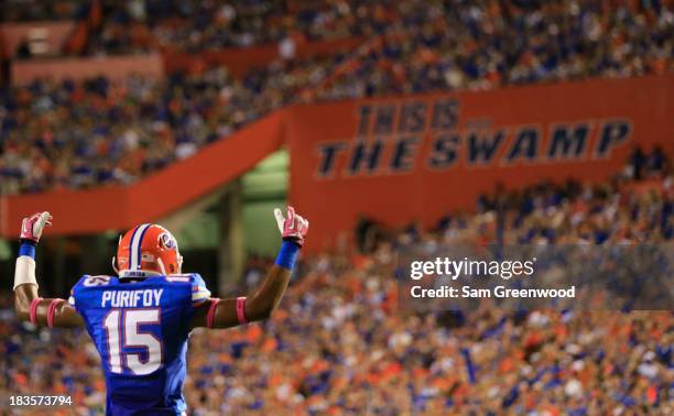 Loucheiz Purifoy of the Florida Gators asks the crowd for noise during the game against the Arkansas Razorbacks at Ben Hill Griffin Stadium on...