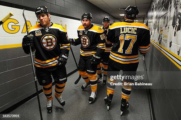 Shawn Thornton, Johnny Boychuk, Matt Bartkowski and Milan Lucic of the Boston Bruins in the hallway before warm ups prior to the game against the...