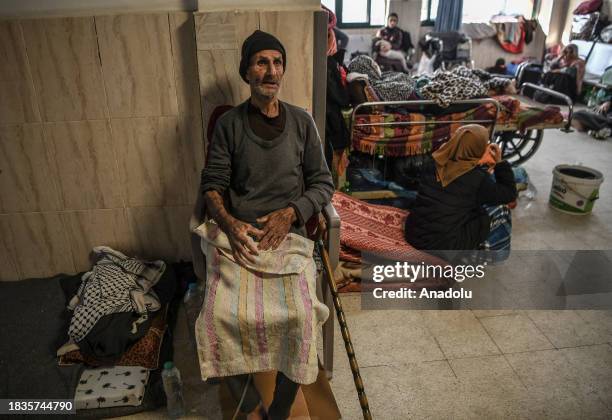 An elderly Palestinian man displaced due to Israeli attacks takes refuge in Nasser Hospital, Khan Yunis, Gaza as the attacks continue on Gaza Strip...