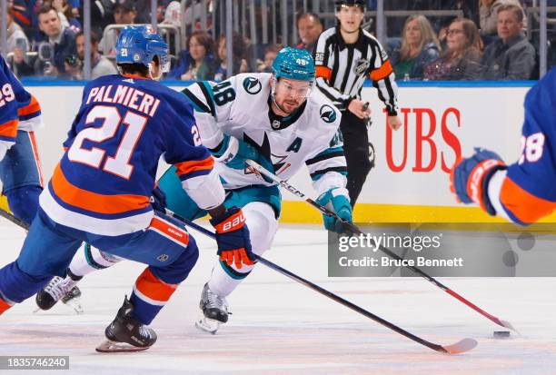 Tomas Hertl of the San Jose Sharks skates against the New York Islanders at UBS Arena on December 05, 2023 in Elmont, New York.