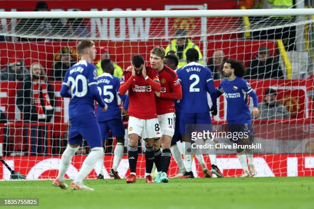 Bruno Fernandes of Manchester United reacts after his penalty kick is saved by Robert Sanchez of Chelsea during the Premier League match between...