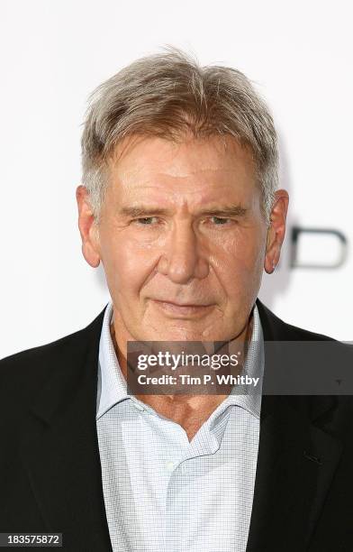 Harrison Ford attends a photocall to promote "Ender's Game" at Odeon Leicester Square on October 7, 2013 in London, England.