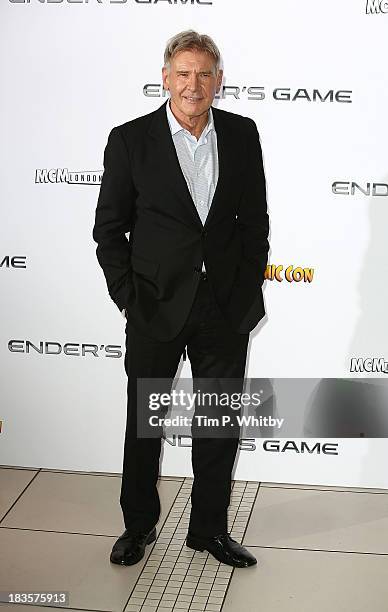 Harrison Ford attends a photocall to promote "Ender's Game" at Odeon Leicester Square on October 7, 2013 in London, England.