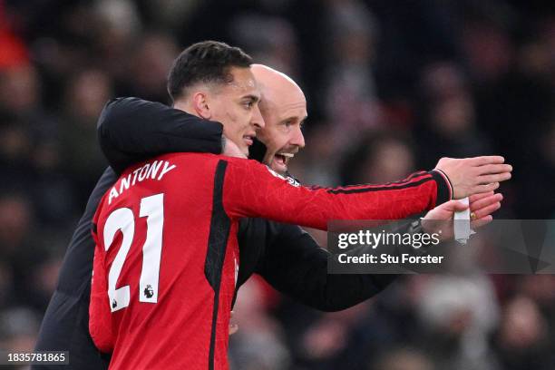 Antony of Manchester United receives instructions from Manager Erik ten Hag during the Premier League match between Manchester United and Chelsea FC...