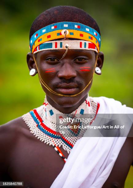 Portrait of a young samburu moran, Samburu County, Samburu National Reserve, Kenya on November 23, 2023 in Samburu National Reserve, Kenya.