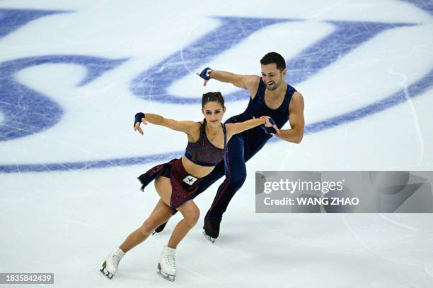 Britain's Lilah Fear and Lewis Gibson compete in the ice dance free skating event during the ISU Grand Prix of Figure Skating Final in Beijing on...