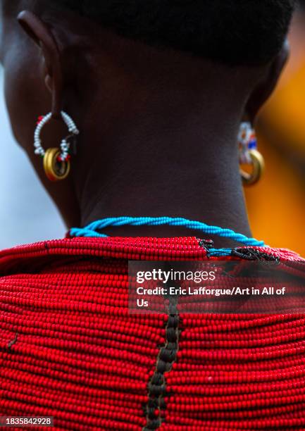 Samburu woman with a beaded red necklace, Samburu County, Samburu National Reserve, Kenya on November 23, 2023 in Samburu National Reserve, Kenya.